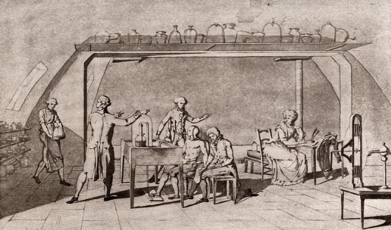 Figure 1: Marie-Anne Lavoisier’s illustration of one of her husband’s experiments in respiration. Seated to the left is collaborator Armand Séguin. Lavoisier’s husband, Antoine Lavoisier, is leaning over the basin toward the right. And Lady Lavoisier herself can be seen at her drawing table on the far right. Séguin is connected to an apparatus to measure the amount of oxygen he consumes with each breath.