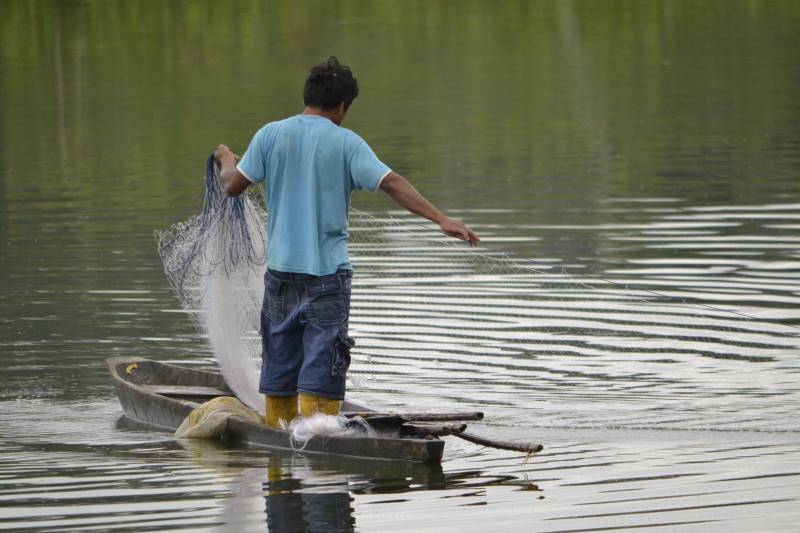 Figure 1: Kichwa man fishing in Limoncocha.